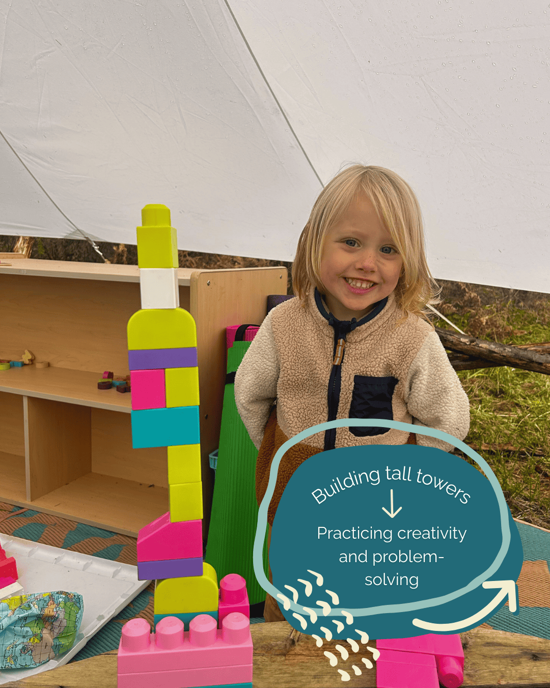 Child smiling in front of megablocks tower with text that says: Building tall towers: Practicing creativity and problem-solving