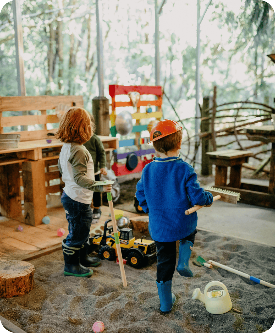Children playing in sand pit at Hidden Meadow School