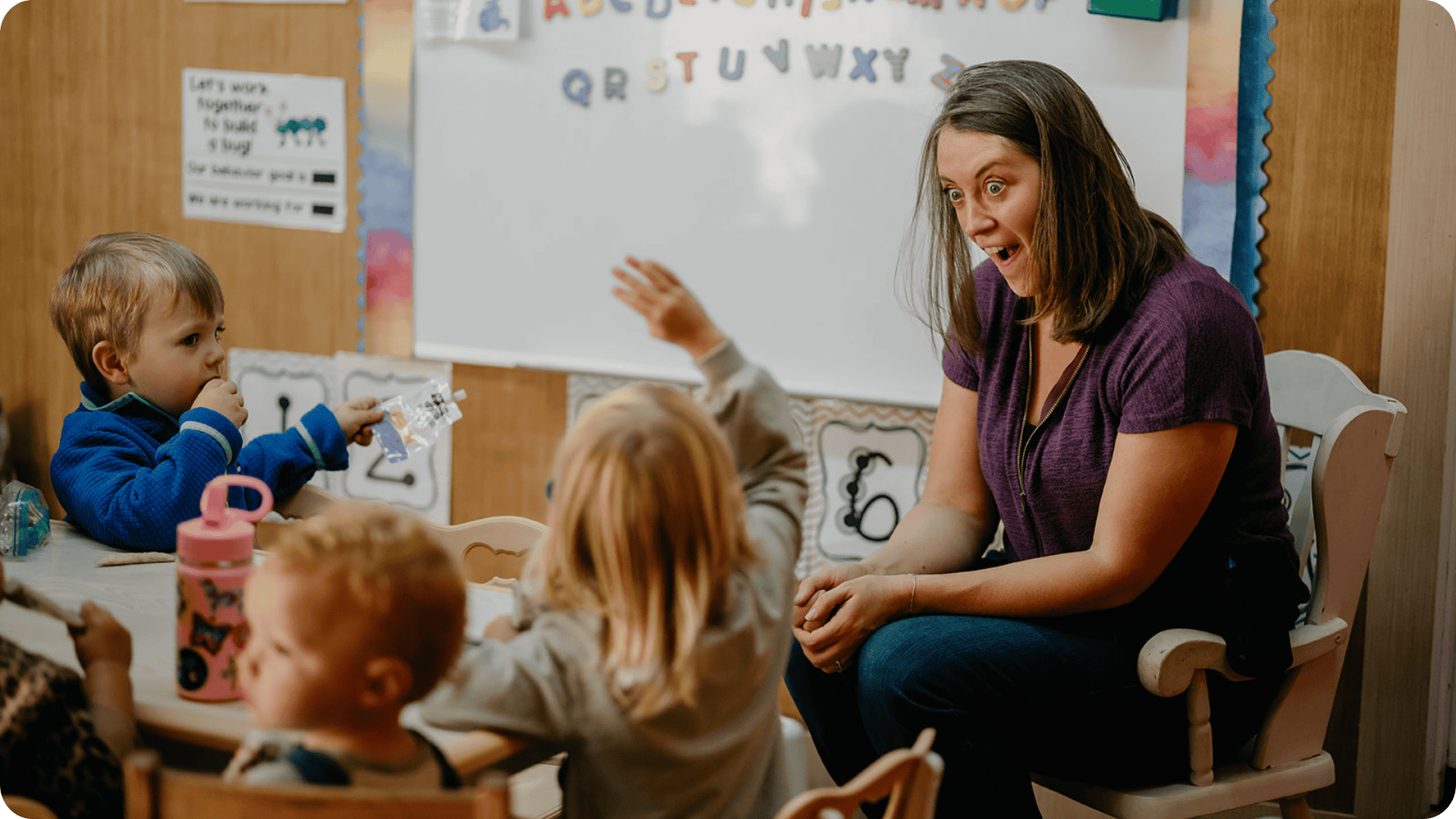 Molly reacting to a child's question at Hidden Meadow School